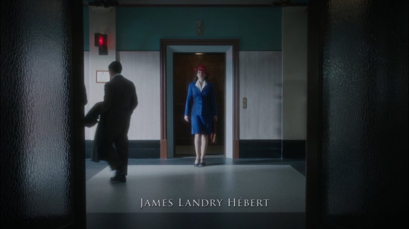 Peggy exits SSR elevator.