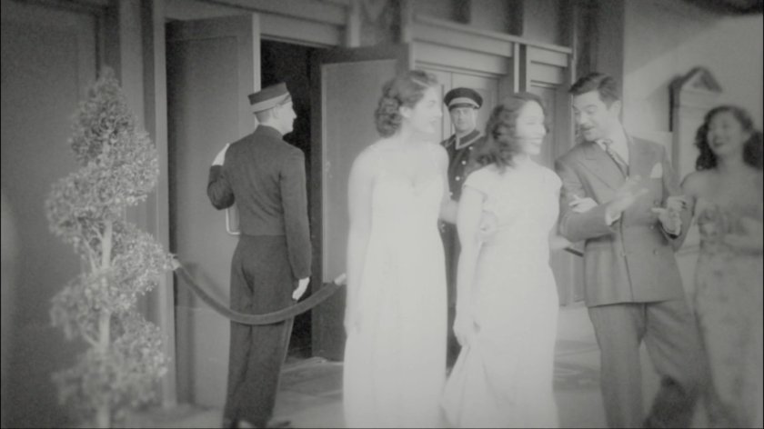 Howard Stark exits theater with three women.