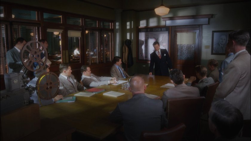 Chief Dooley talks to Agents in SSR Conference room.