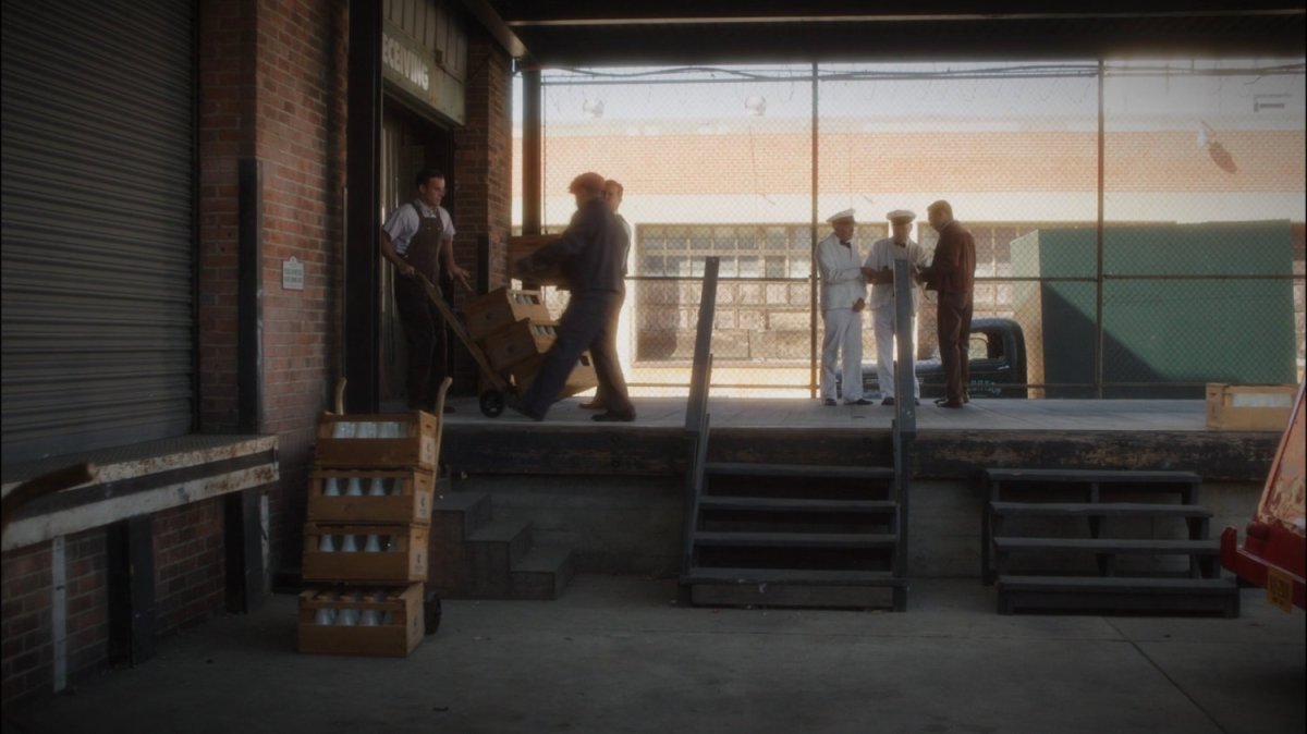 Workers on loading dock of Daisy Clover Dairy.