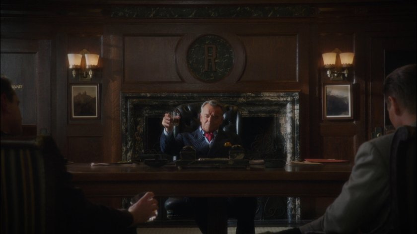 Hugh Jones in his office at Roxxon.