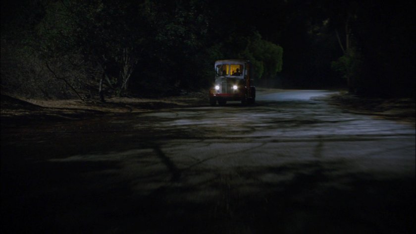 Milk truck on a dark, twisty New Jersey road.
