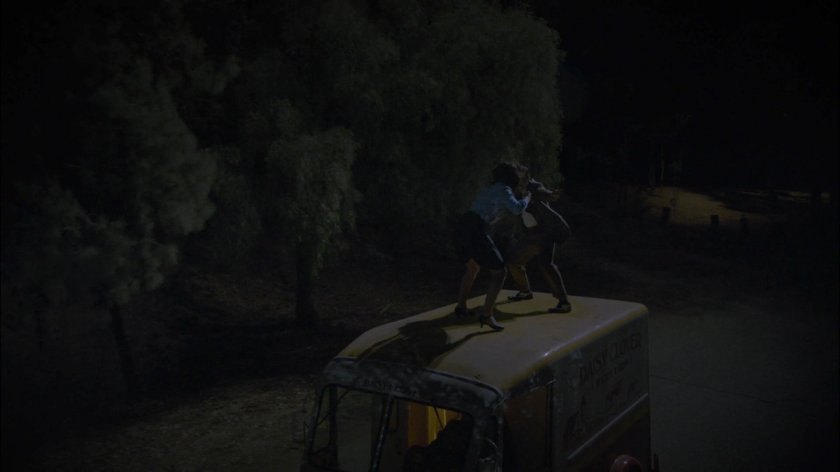 Fight on top of Daisy Clover truck on New Jersey road.