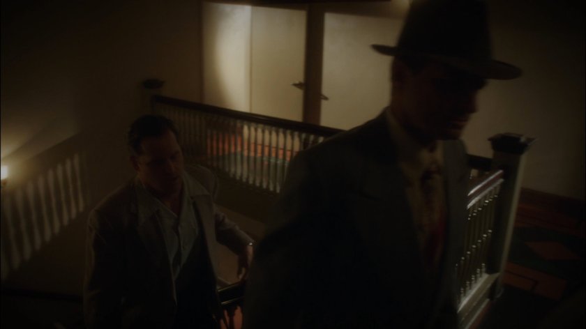 Dooley and Krzeminski in stairway of Hotel Cosmopole.