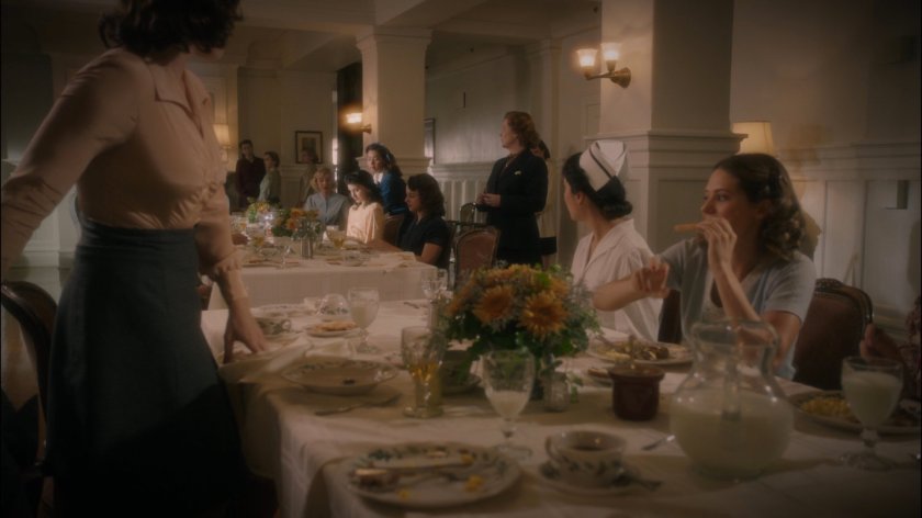 Women sitting around the dining room of the Griffith Hotel.