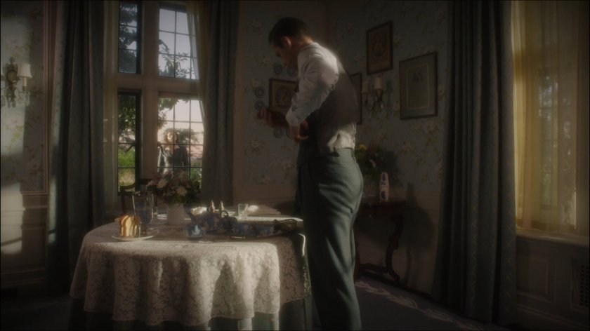 Jarvis setting the table in Howard Stark's mansion.