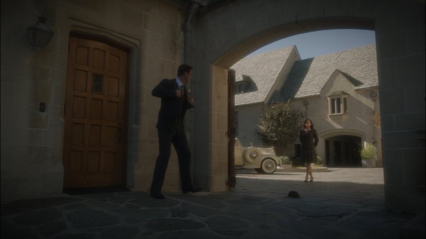 Jarvis and Peggy outside Howard Stark's mansion.
