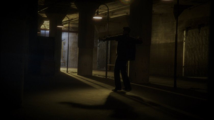 Man inside railyards warehouse.