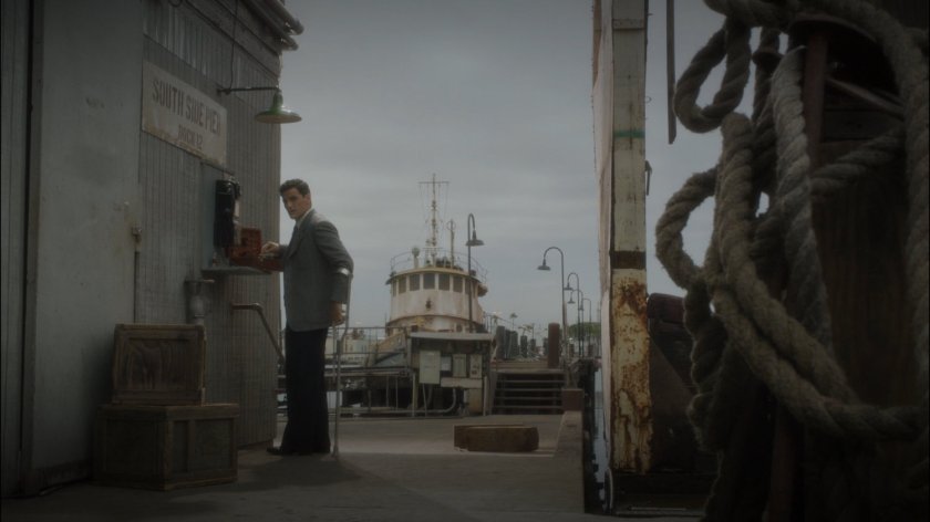 Sousa checks a pay phone by Dock 12.