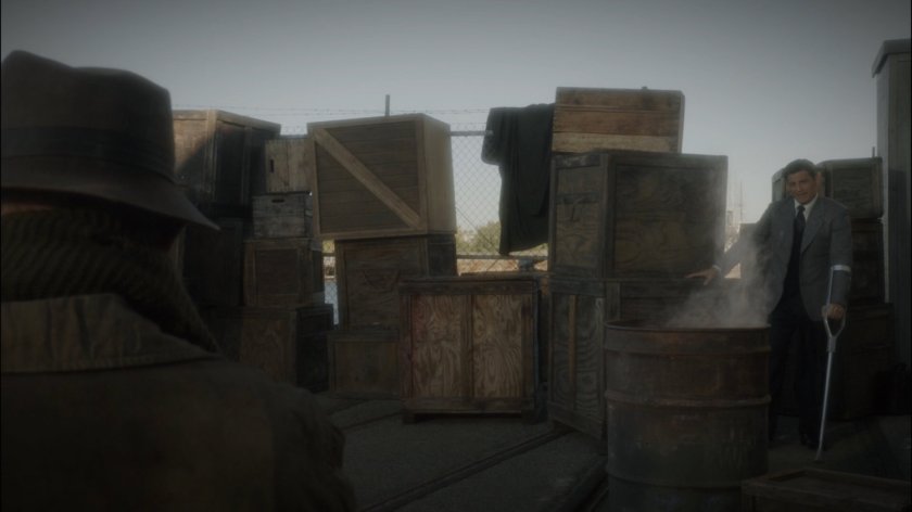 Sousa approaches two hobo's playing cards on Dock 12.