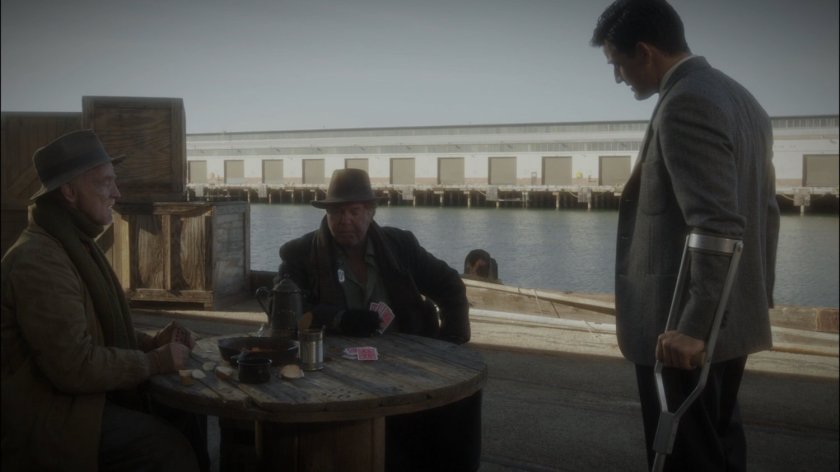 Sousa questions two hobo's playing cards on Dock 12.