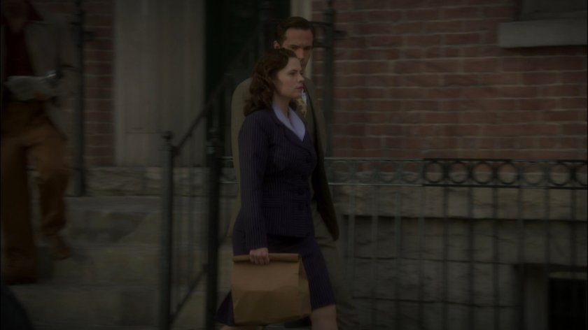 Peggy and Jarvis on a sidewalk in New York city.