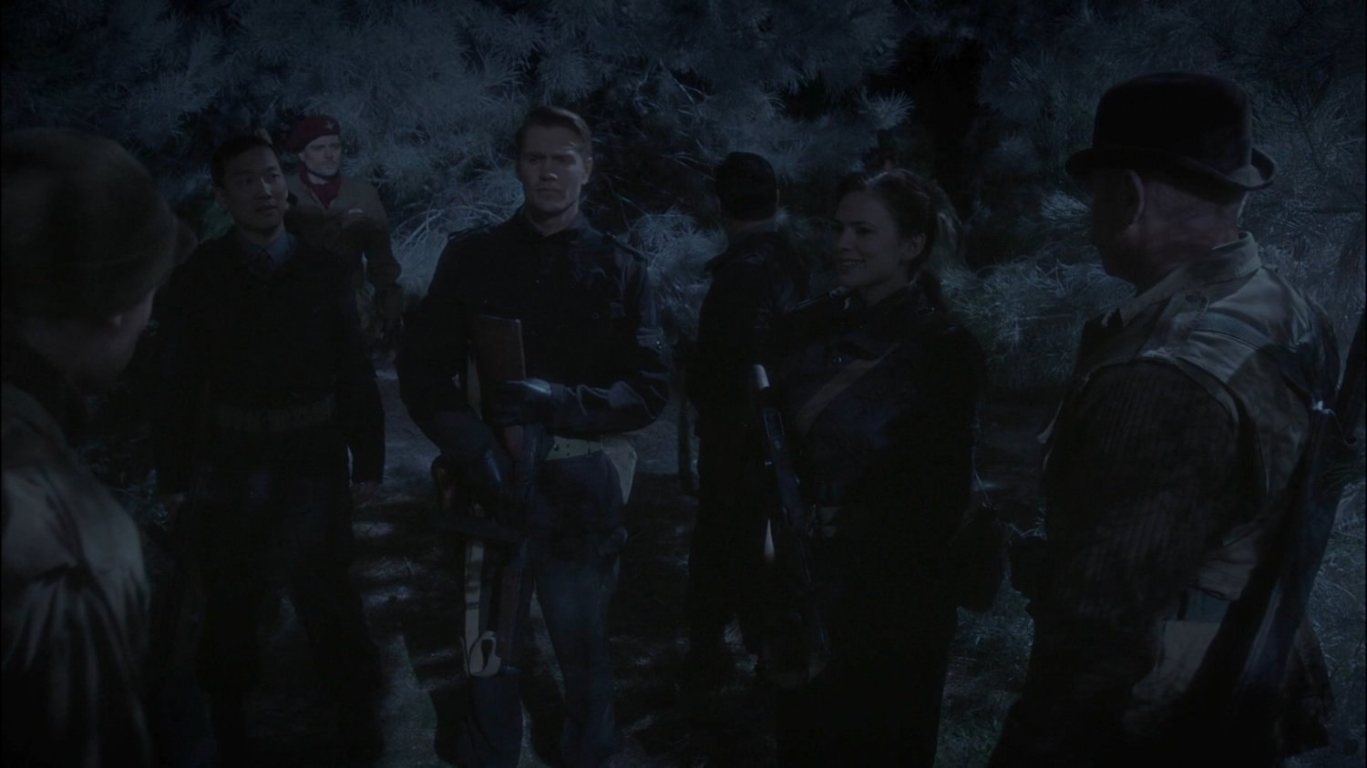Thompson, Carter and the Howling Commandos in a Polish forest.