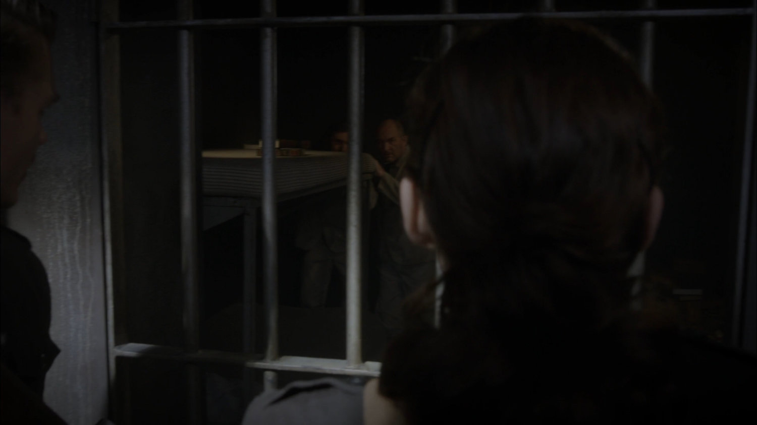 Looking into a prison cell.