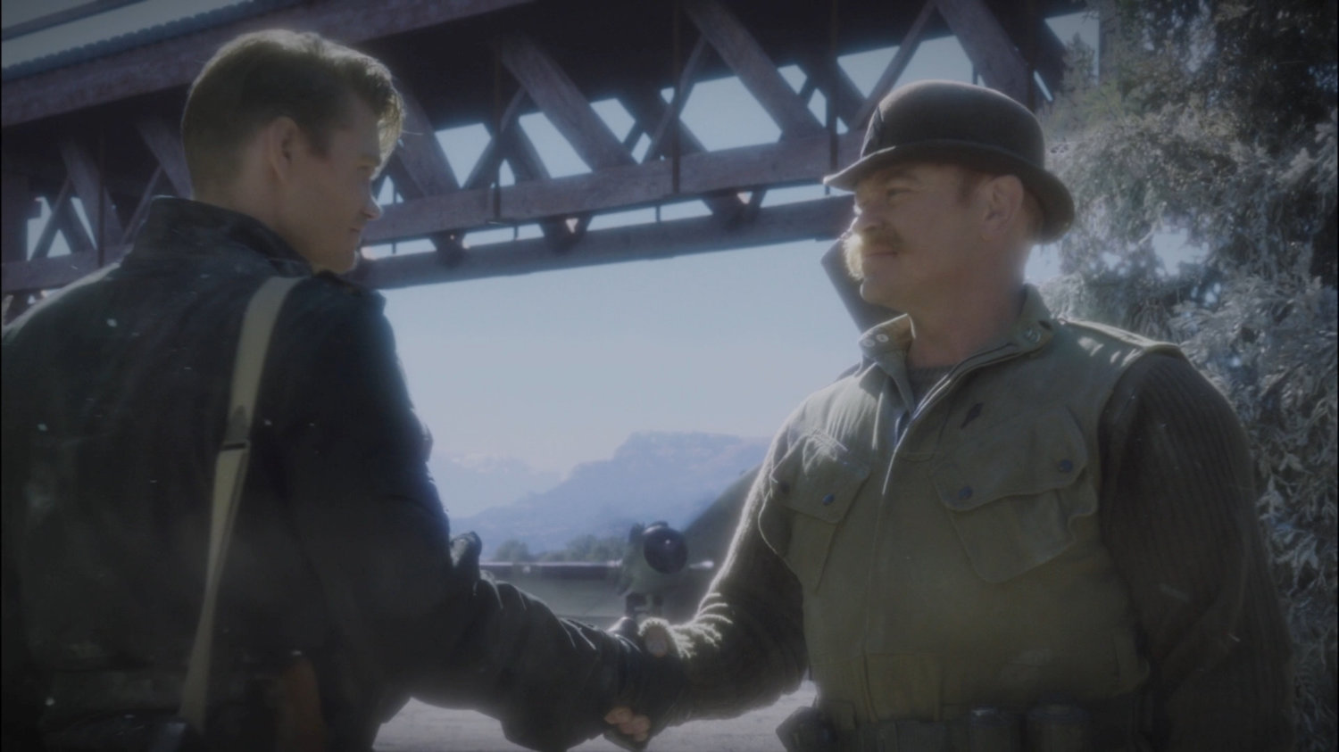 Thompson shakes Dum Dum Dugan's hand in Belarus.