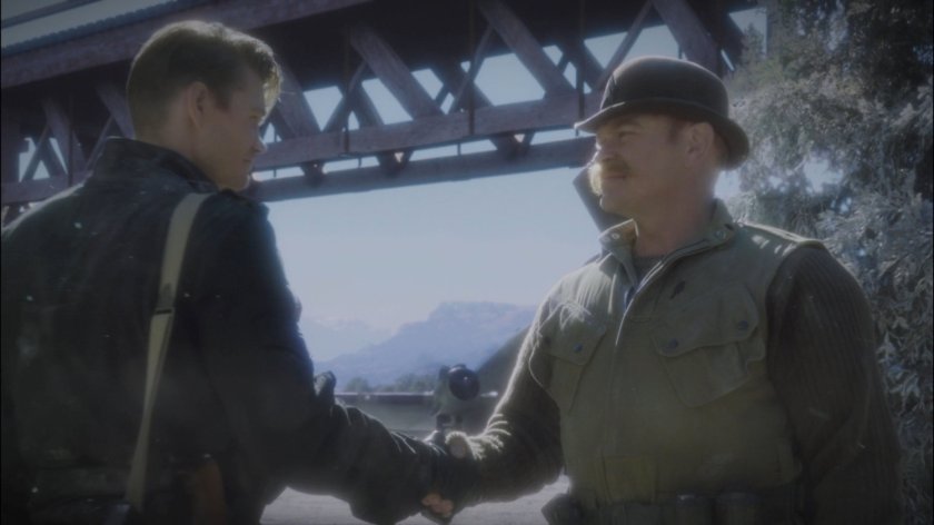 Thompson shakes Dum Dum Dugan's hand in Belarus.