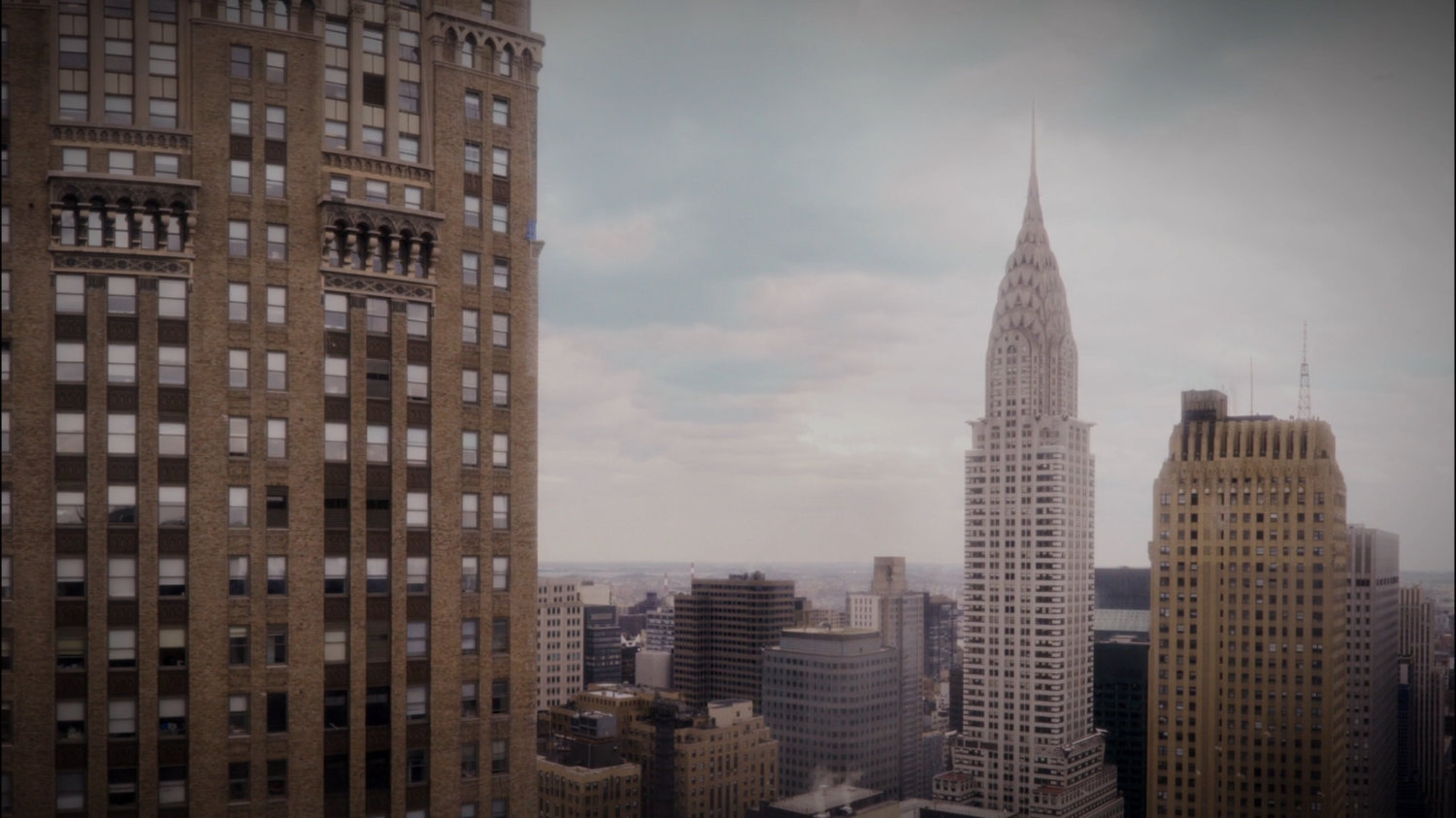 Aerial of New York City, featuring the Chrysler building.