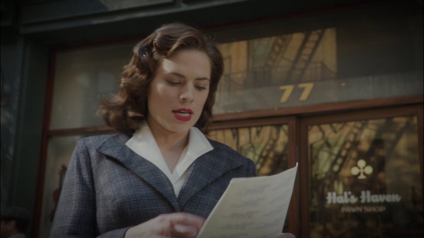 Peggy in front of Hal's Haven Pawn Shop.