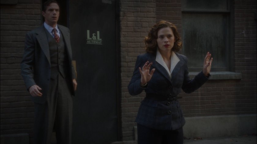 Jarvis and Peggy in alley behind Automat.