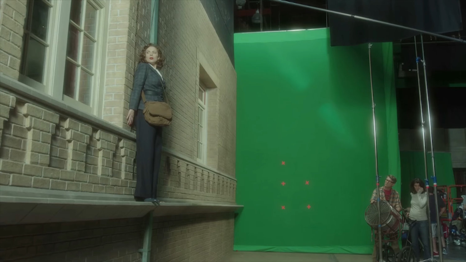 Behind the scenes: Peggy on a ledge outside the Griffith Hotel.