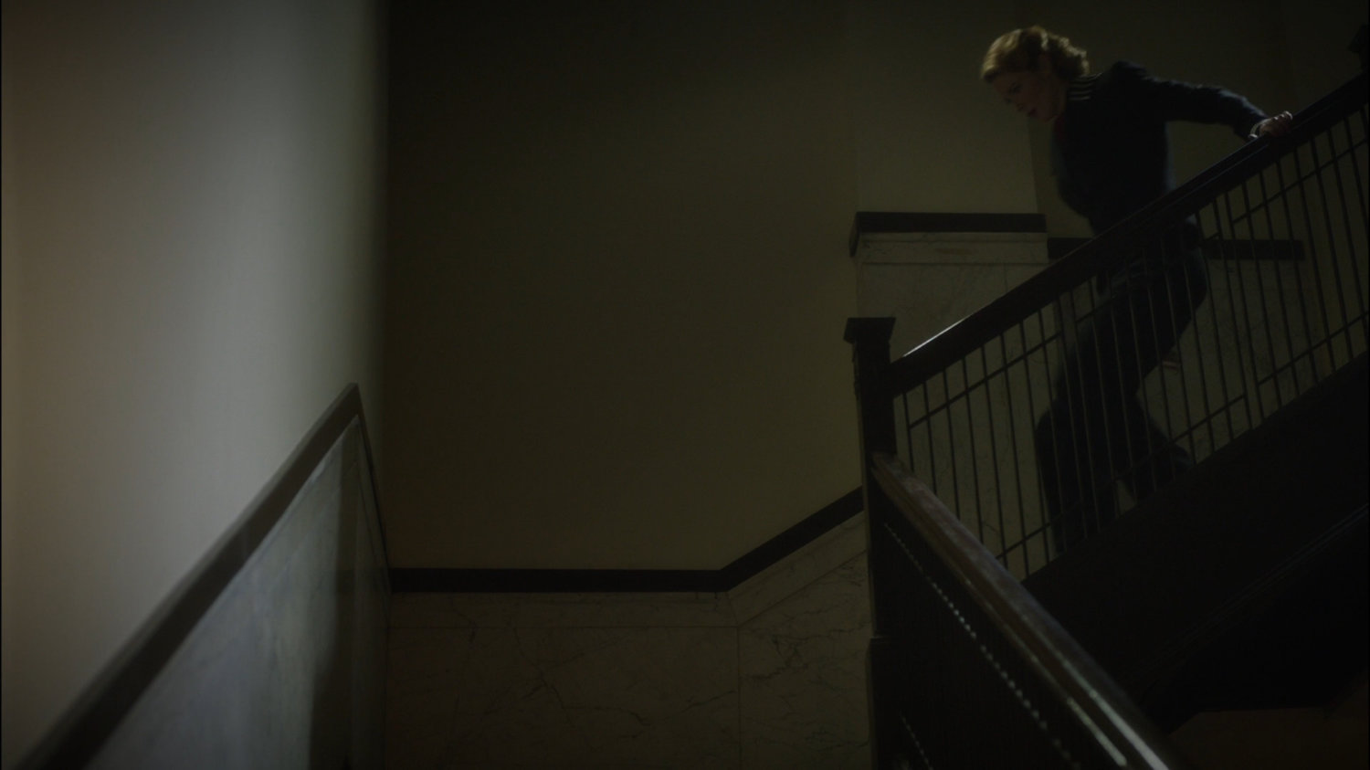 Dottie runs down Dentist Office stairwell.