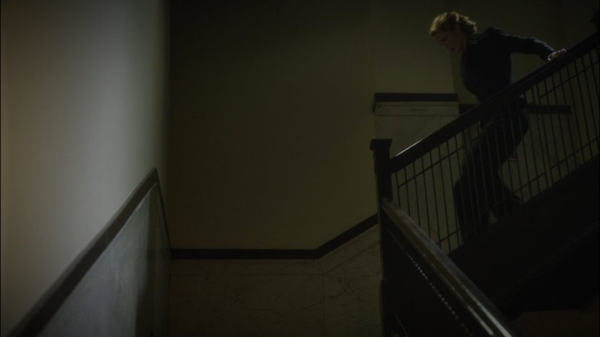 Dottie runs down Dentist Office stairwell.