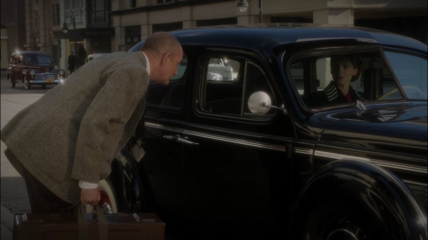 Dr. Ivchenko speaks to Dottie in car outside Hudson Grand Hotel.