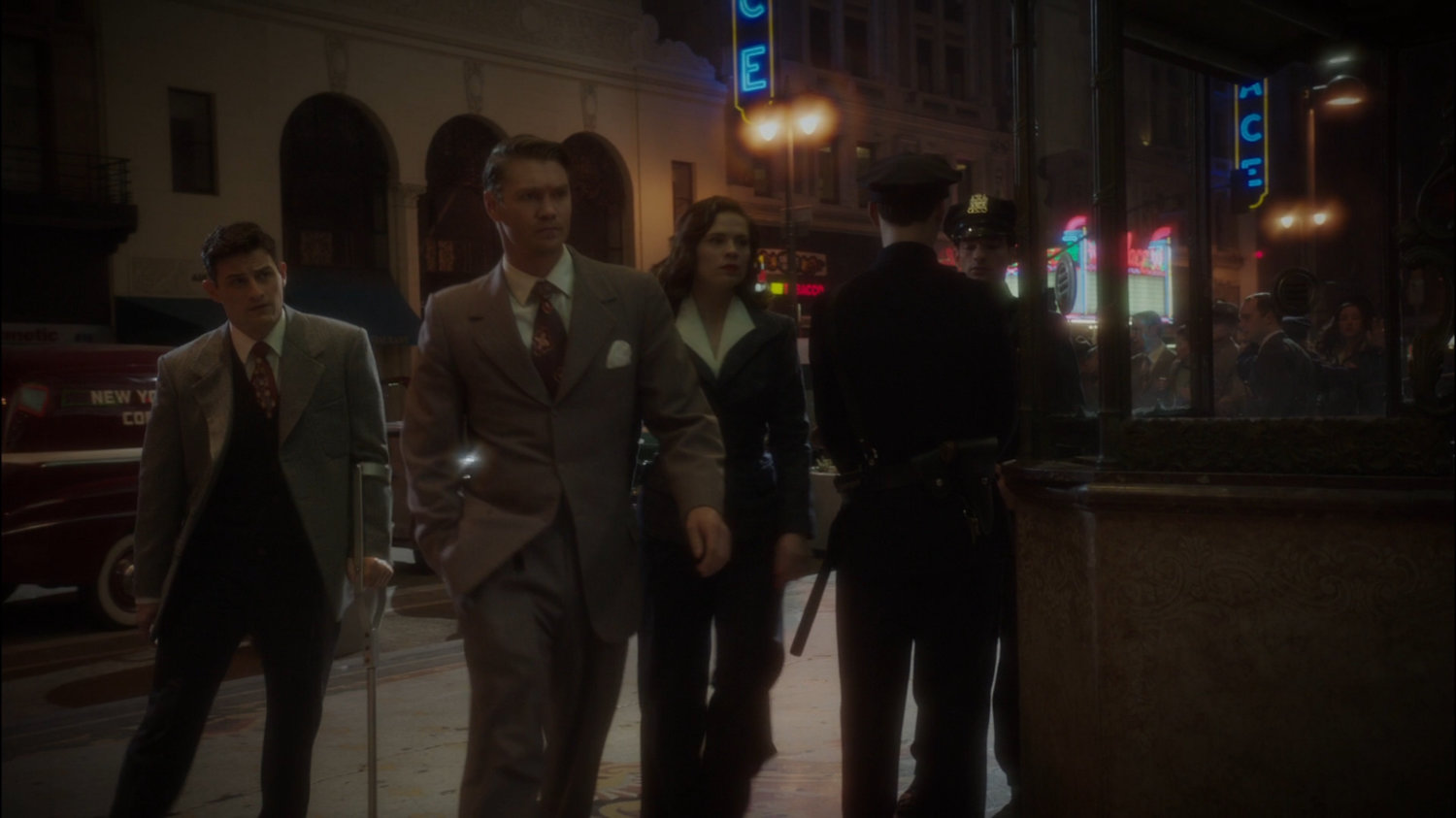 Sousa, Thompson and Peggy outside New York movie theater.