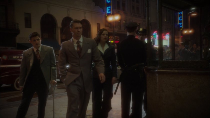 Sousa, Thompson and Peggy outside New York movie theater.