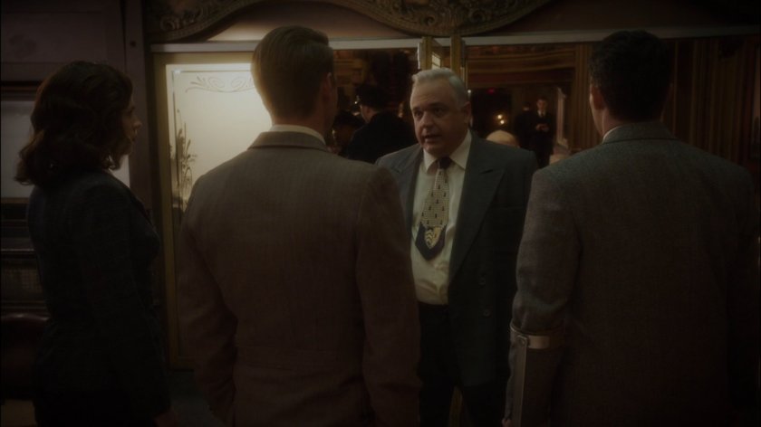 SSR Agents talk to manager of New York movie theater.