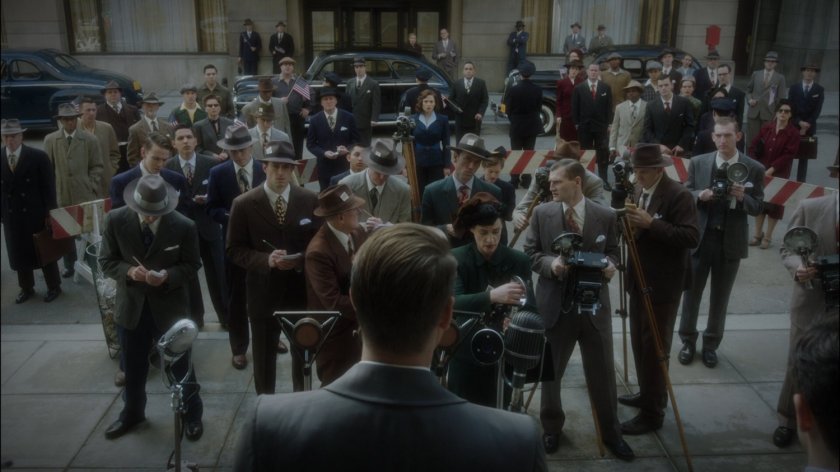 Thompson gives a press conference for Howard Stark outside New York City Hall.