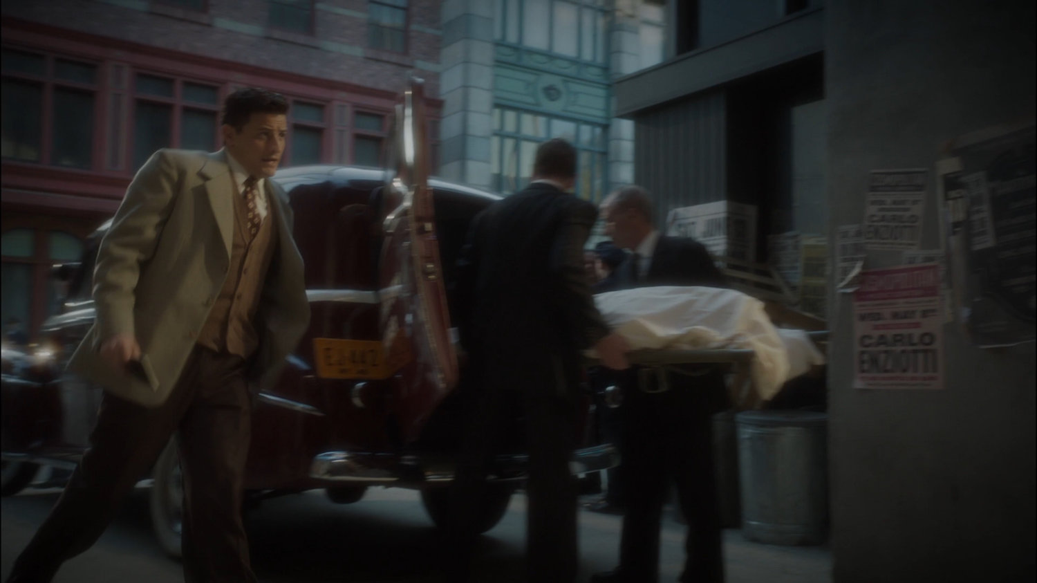 Sousa in a New York alley by ambulance.