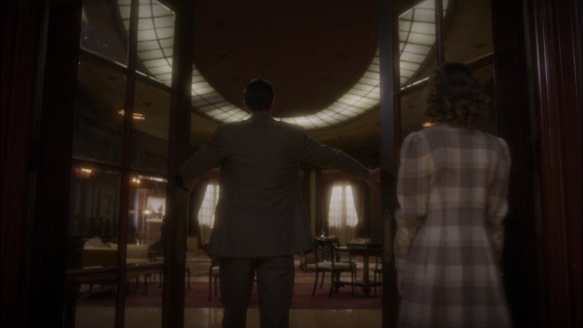 Jarvis and Angie inside of Stark Mansion.