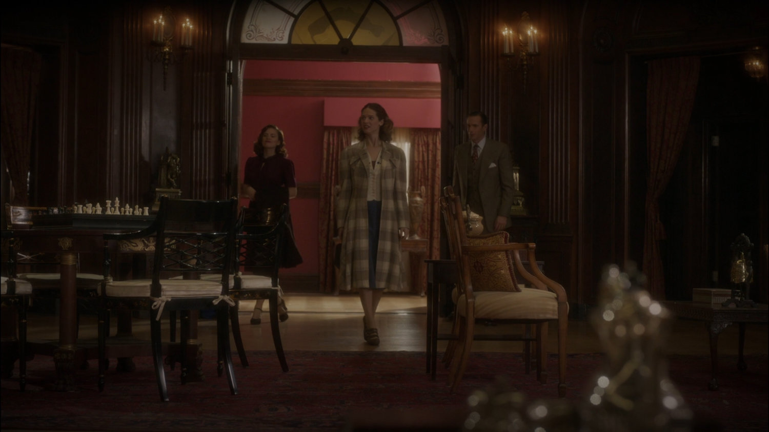 Peggy, Angie and Jarvis inside Stark Mansion.