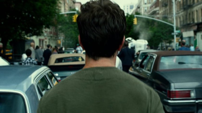 Jack Murdock walking into crowded intersection.