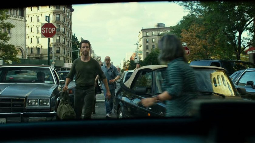 Jack Murdock walking into crowded intersection.