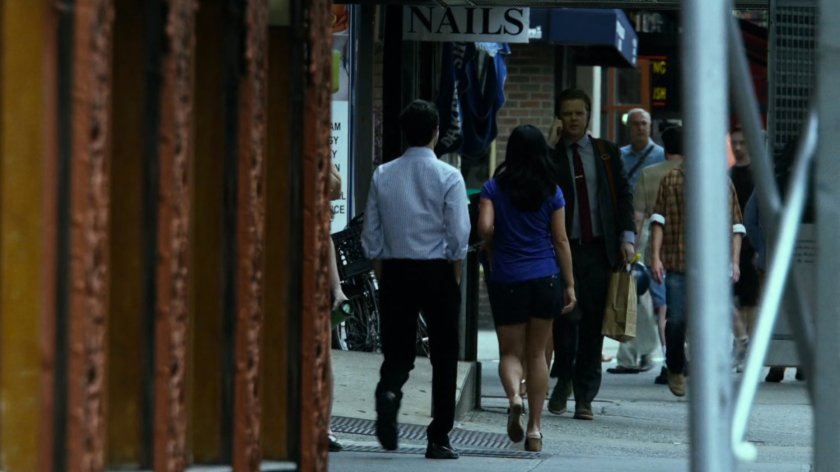 Foggy on the phone on a sidewalk.