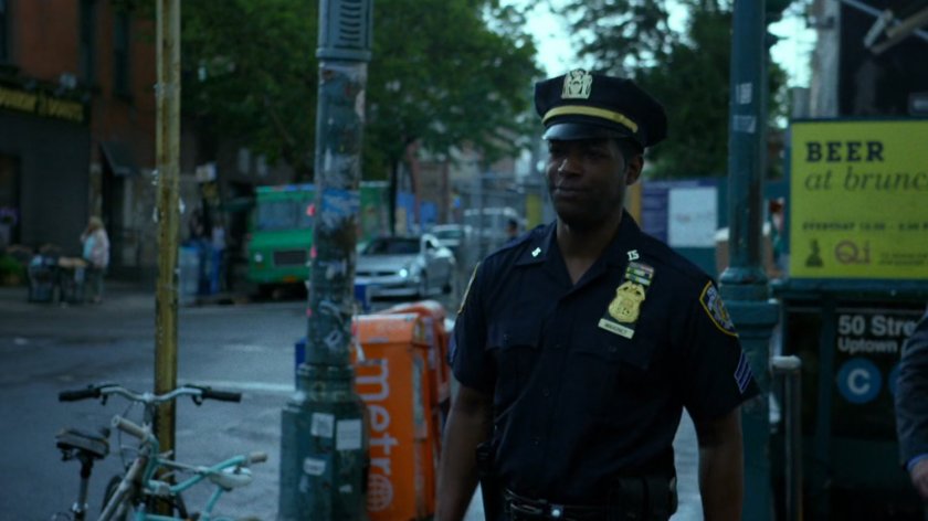 Brett standing on a sidewalk.