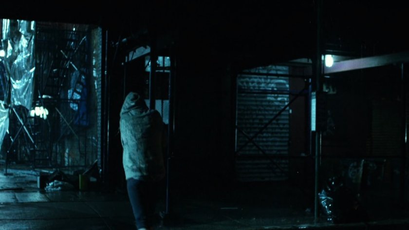 Rainy exterior of Karen's apartment.