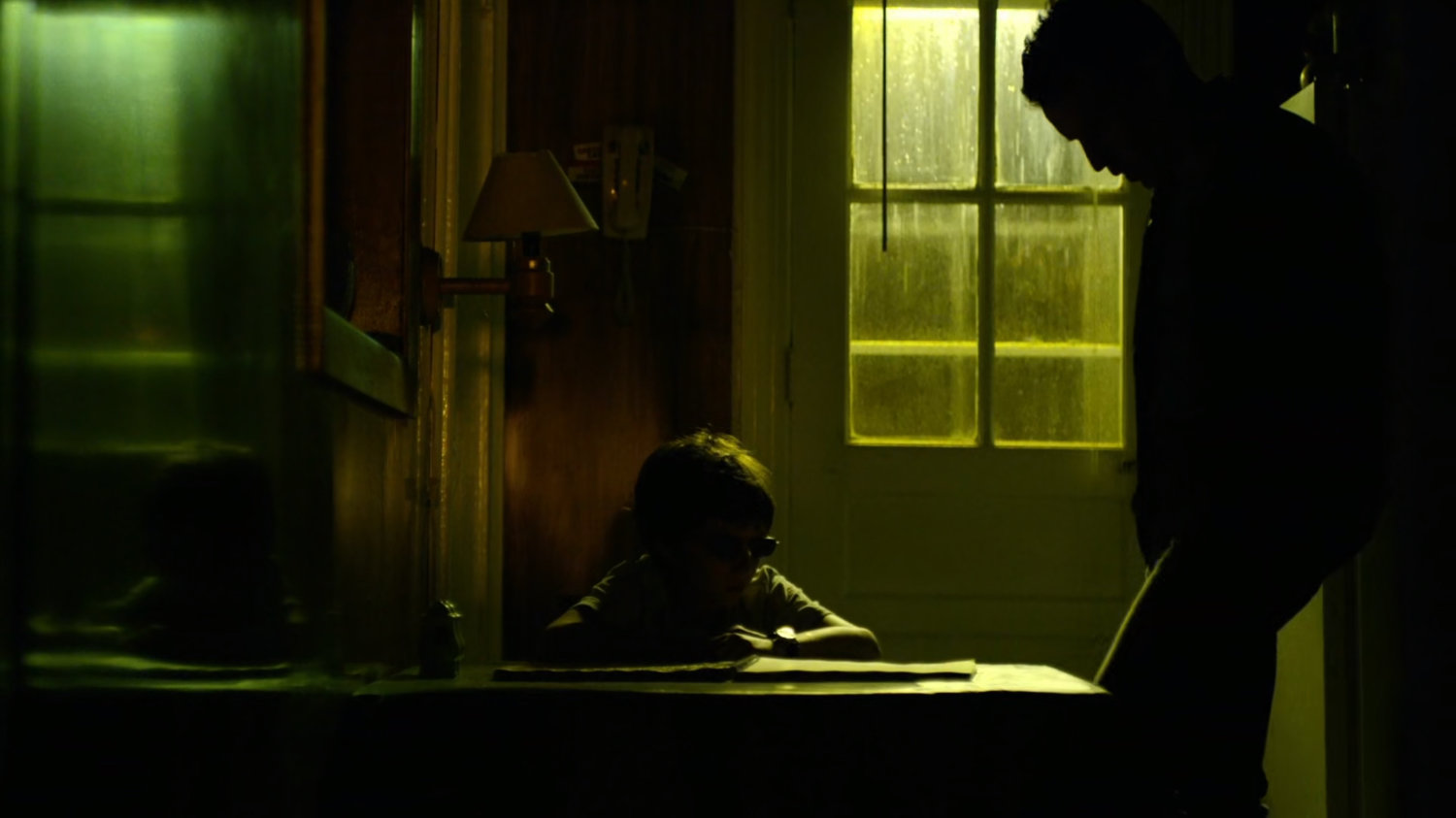 Matt and his father in their kitchen.