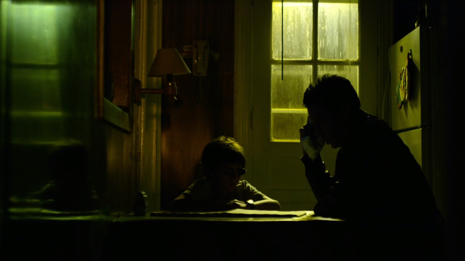 Matt and his father in their kitchen.
