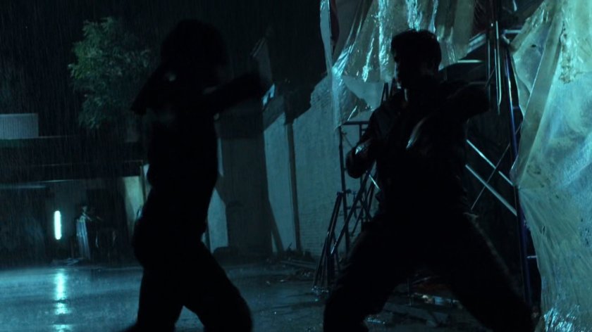 Matt fights Rance in the rain outside Karen's apartment.