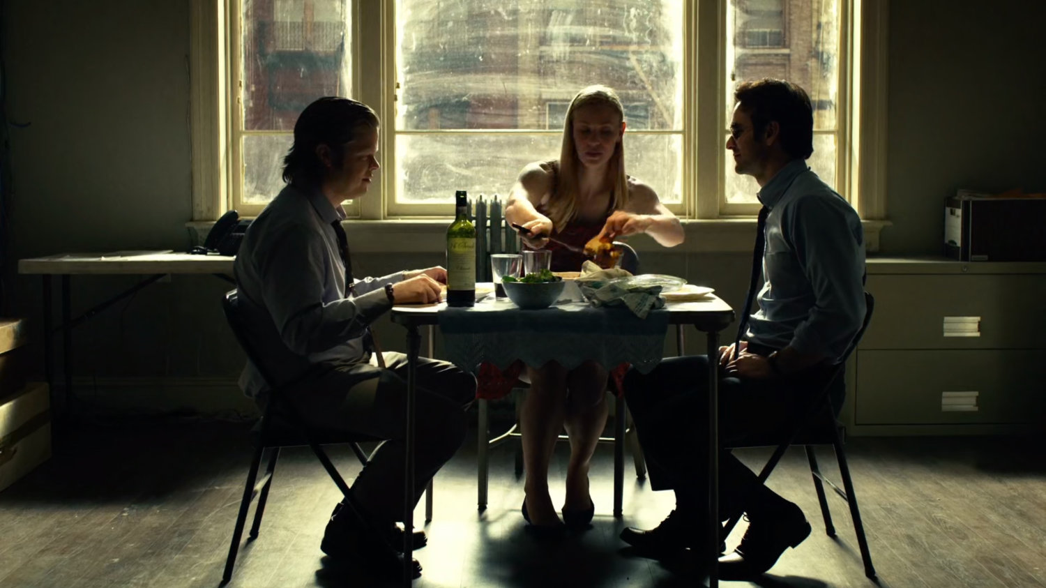 Foggy, Matt and Karen sharing a meal in their law offices.
