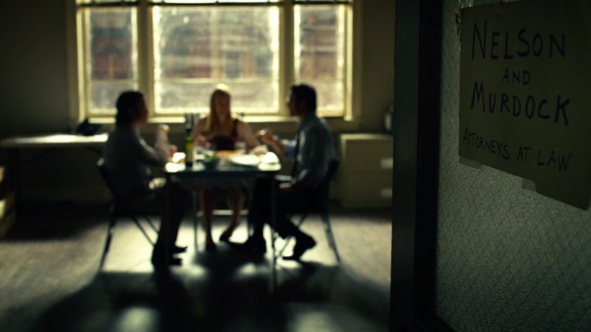 Foggy, Matt and Karen sharing a meal in their law offices.