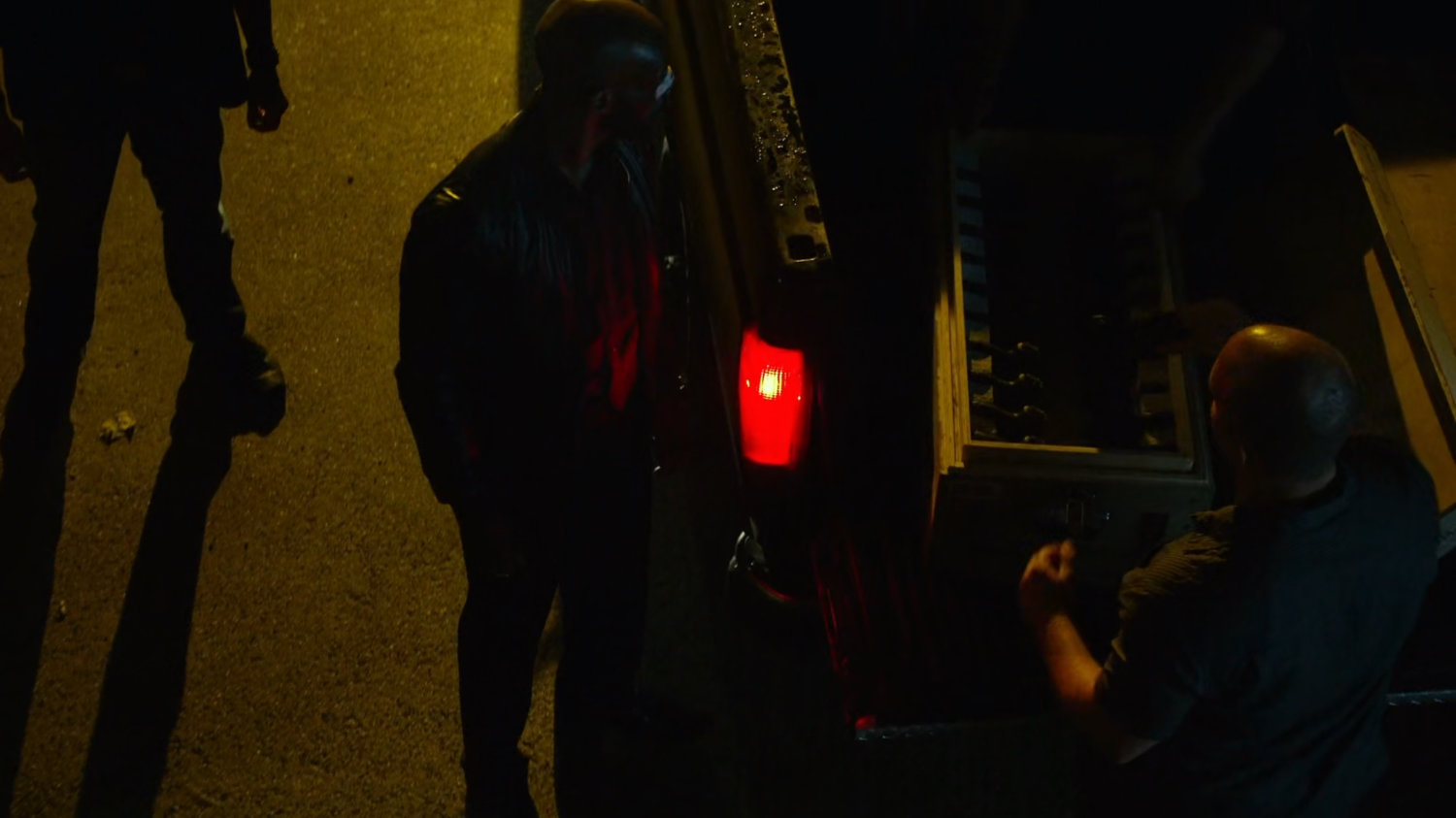 Turk buying a gun in a dark alley.