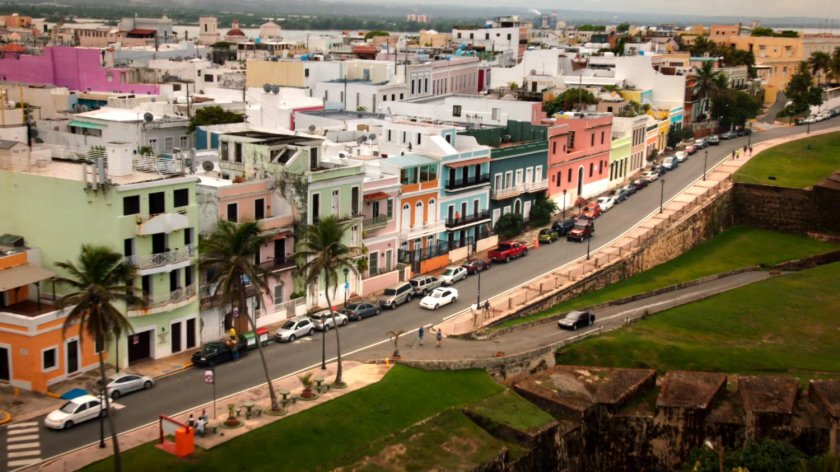 Aerial of colorful houses and road in San Juan.
