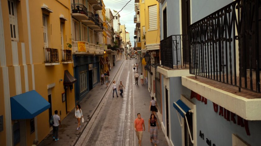 Bobbi and Hunter walk on a San Juan street.