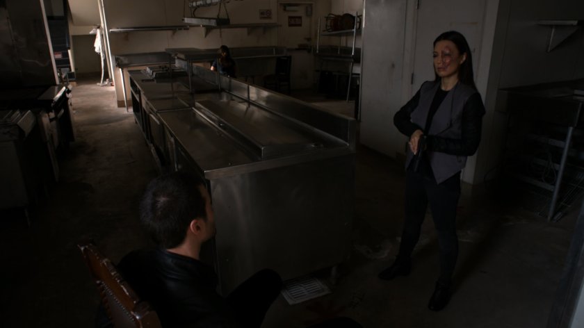 Agent 33 and Ward in the kitchen of the Ponce De Leon Theater.