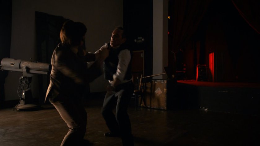 Coulson fights inside the Ponce De Leon Theater.