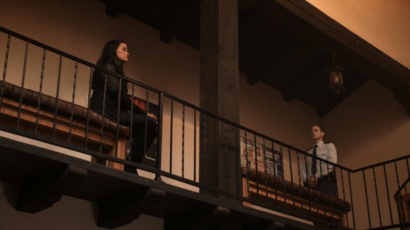 Sif sitting on balcony in Faro police station.